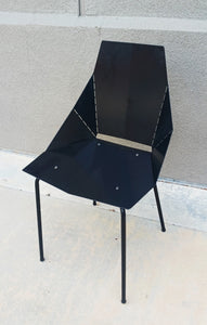 Modern black origami futuristic metal chair
